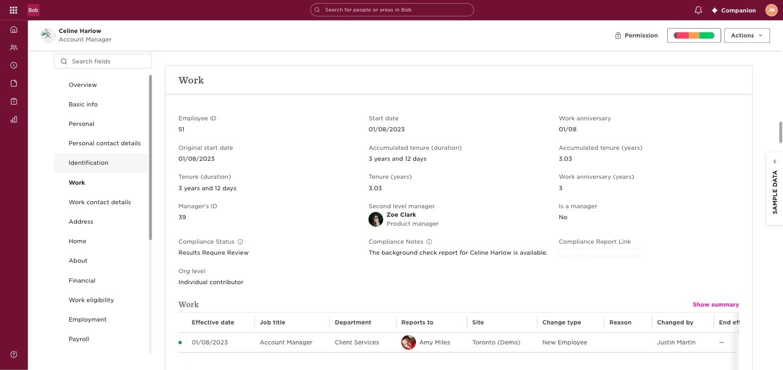 Employee record showing Compliance Status Results Require Review with a note that the report is available and a link